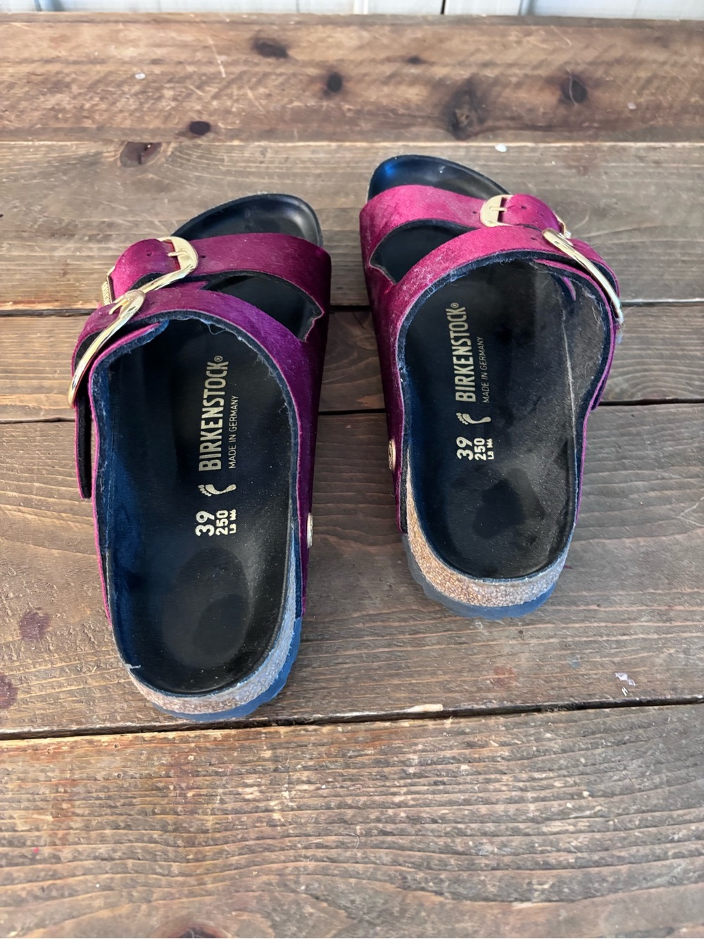 Birkenstock Arizona Two-Strap Sandal โ Plum Suede with Gold Buckles